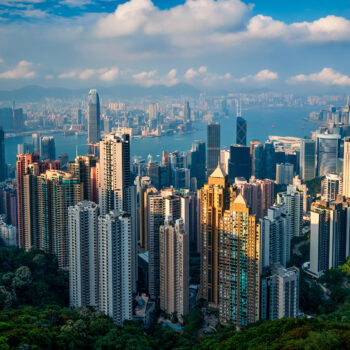 Famous view of Hong Kong - Hong Kong skyscrapers skyline cityscape view from Victoria Peak on sunset. Hong Kong, China